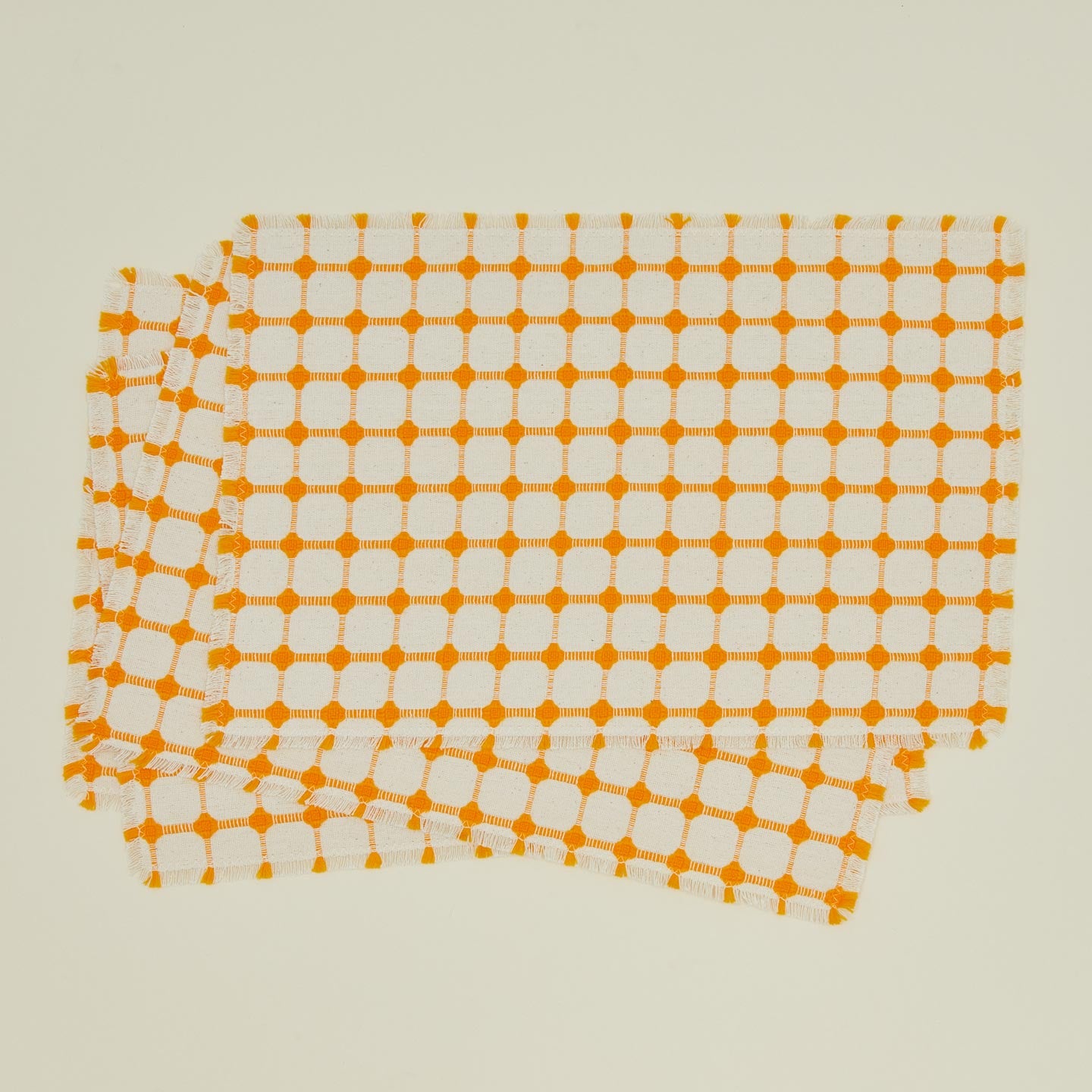 Dove and Donkey wicker fringed placemat in marigold