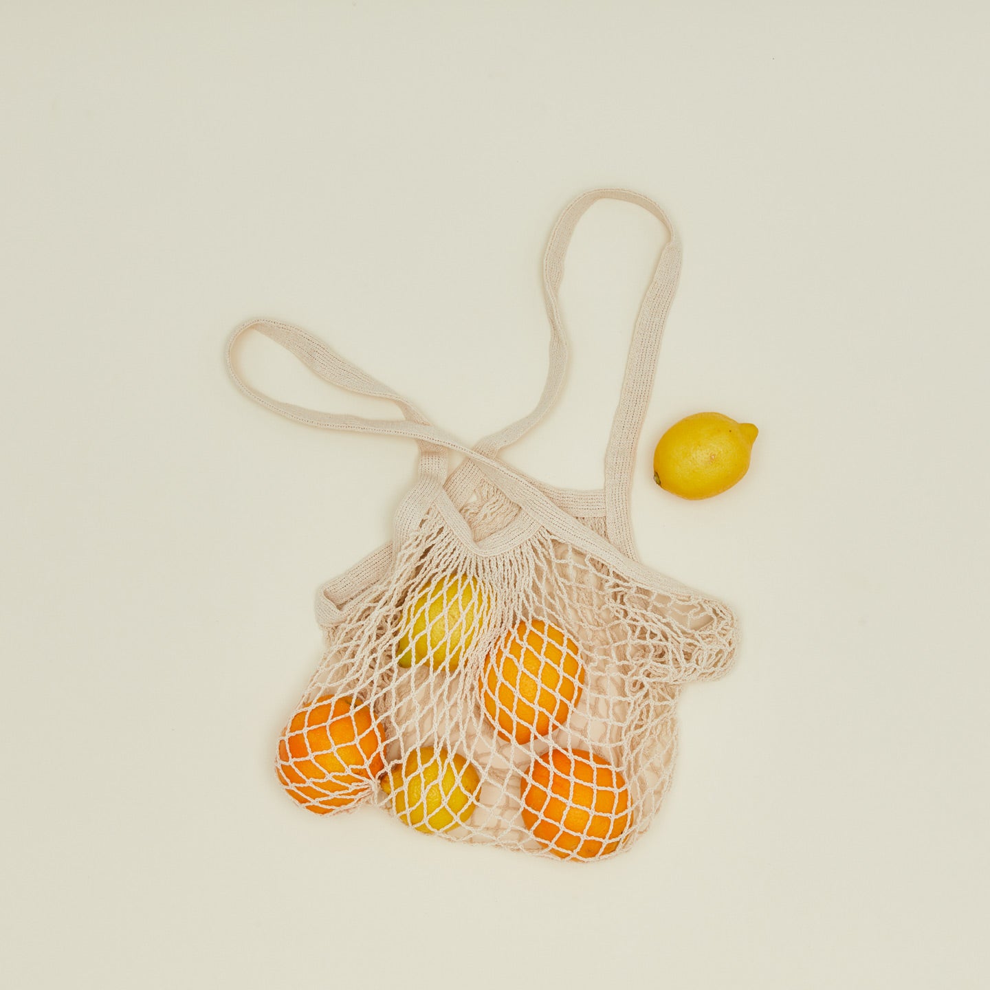 Ecofreax reusable mesh cotton grocery bag with oranges and lemons