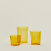 Group of three Essential Glasses in Amber in Small, Medium and Large sizes.
