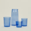 Small, Medium and Large Essential Glasses with Essential Glassware Pitcher in Blue.