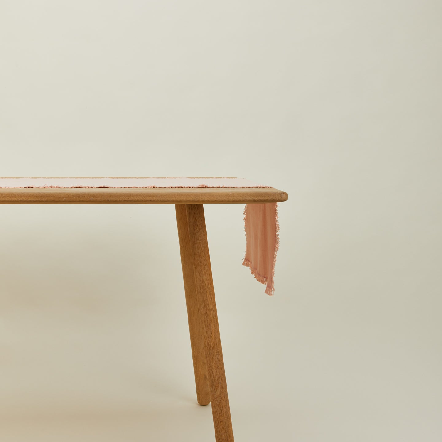Essential blush runner on table