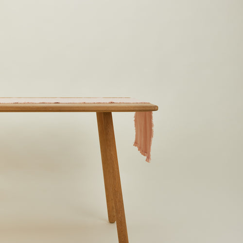 Essential blush runner on table