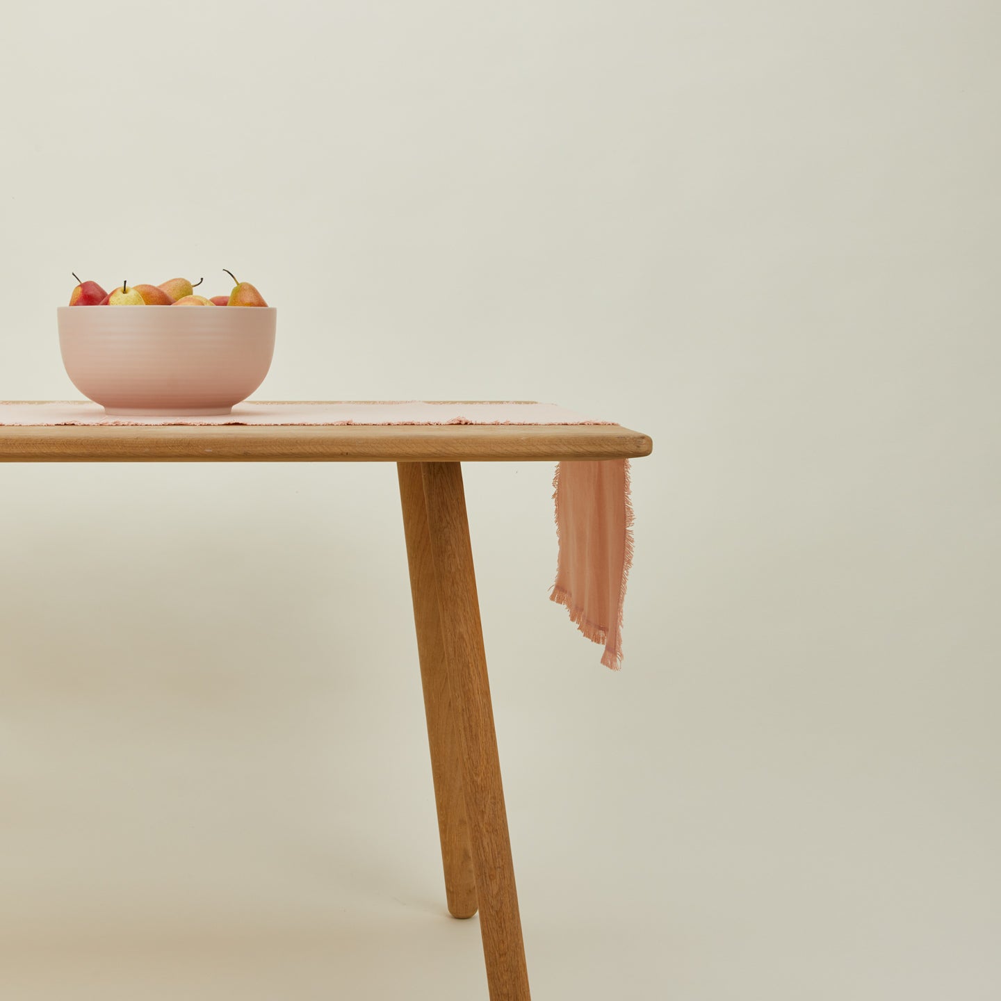 Essential blush runner on table with serving bowl