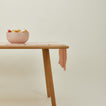 Essential blush runner on table with serving bowl