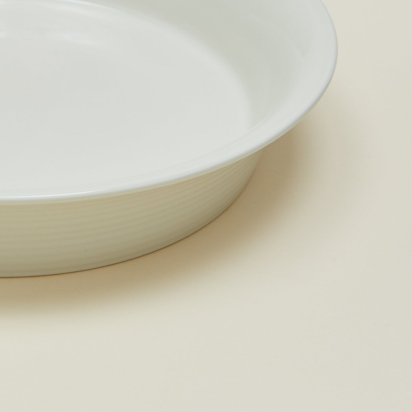 Close up view of Essential pie dish in bone
