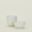 Four bone white Essential Large Bowls.
