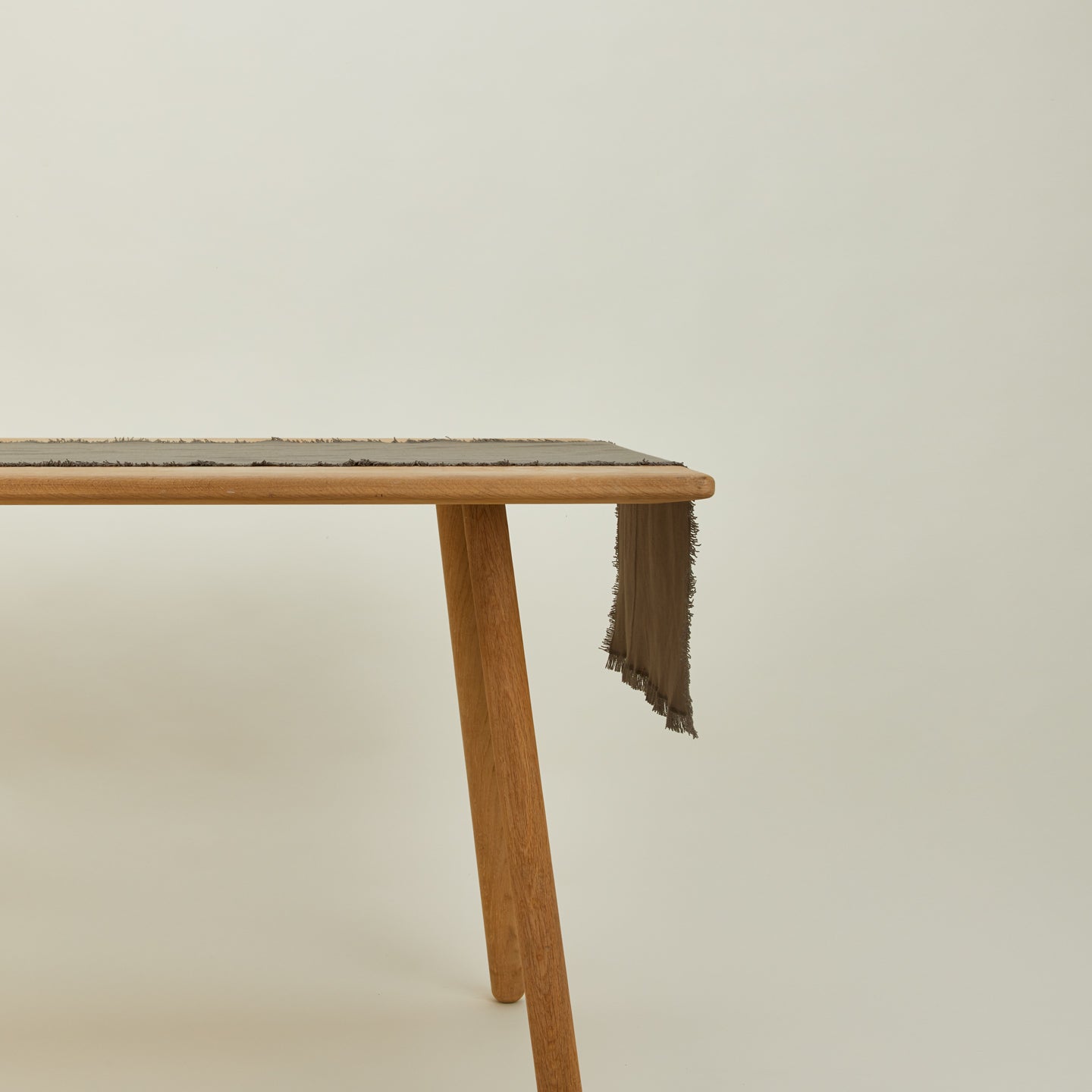 Essential dark grey runner on table