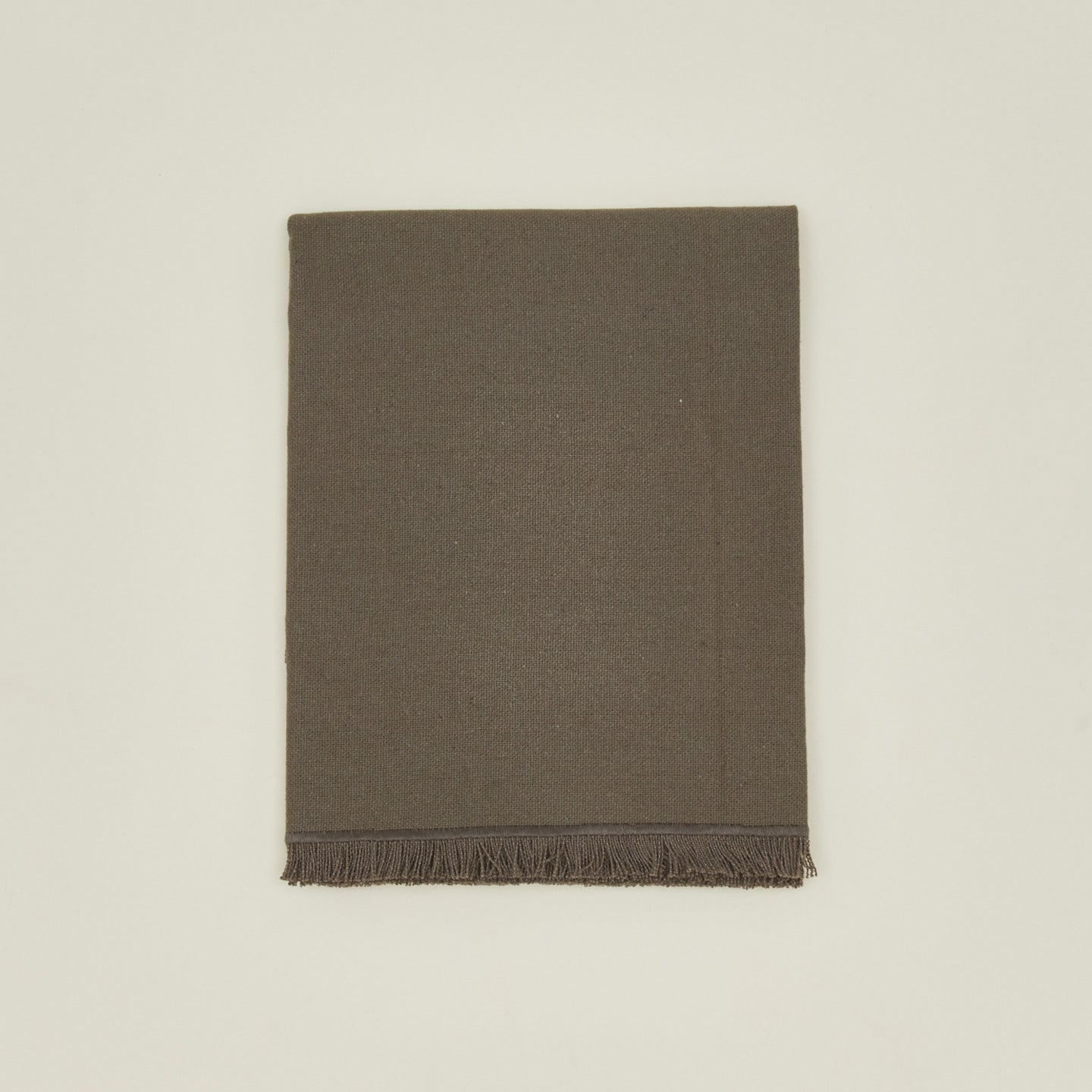 Folded view of essential dark grey runner