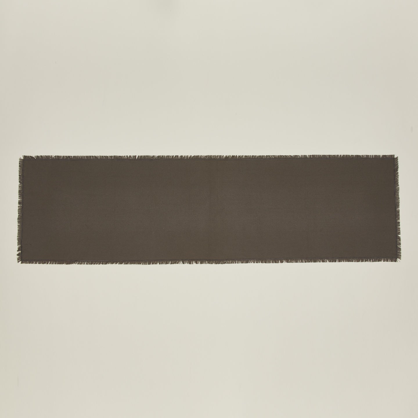 Overhead view of essential dark grey runner