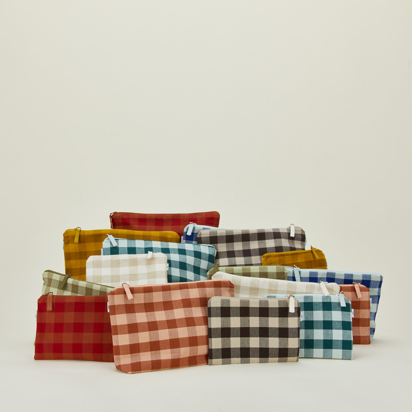 Essential gingham pouches in various colors and sizes