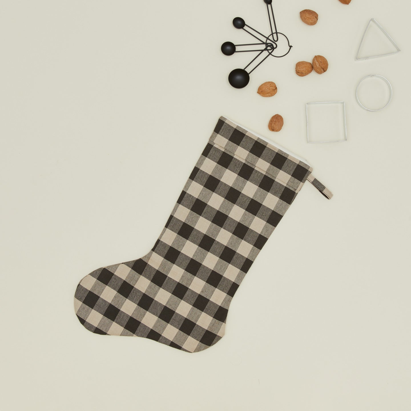 Essential Gingham Stocking - Light Grey/ Black with walnuts, cookie cutters and measuring spoons
