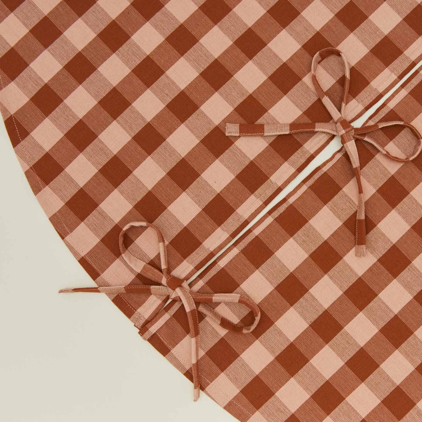 Detailed view of Essential GIngham Tree Skirt - Blush/Terracotta