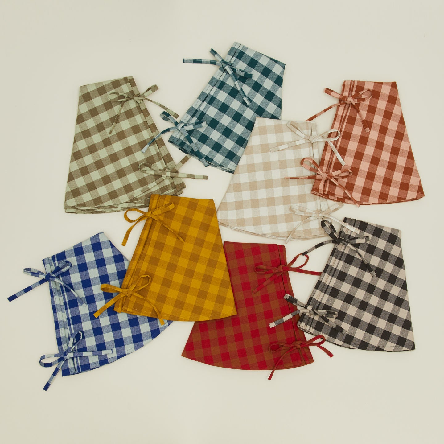 Essential gingham tree skirts in various colors