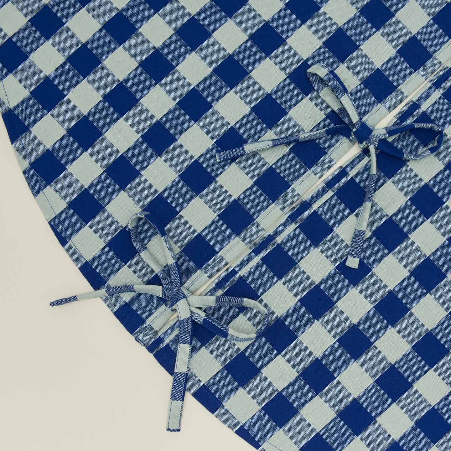 Detailed view of Essential GIngham Tree Skirt - Sky/Blue