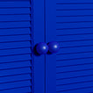 Large sphere knobs in klein blue on cabinet