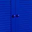 Small sphere knobs in klein blue on cabinet doors