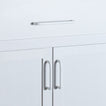Large and small essential drawer pulls in white on cabinet and drawer