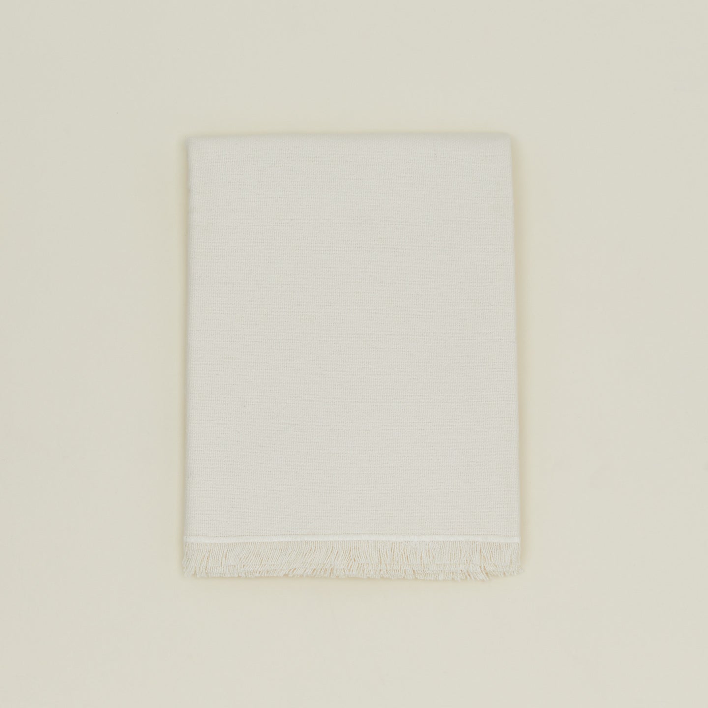 Folded view of essential ivory runner