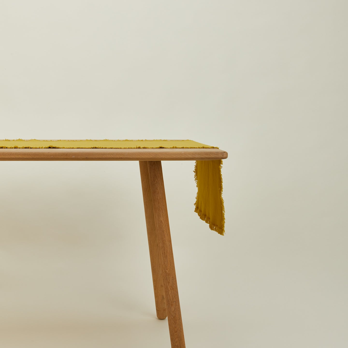 Essential mustard runner on table