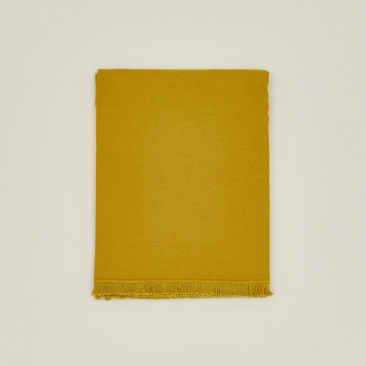 Folded view of essential mustard runner