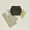 8x8 bakeware in olive with asparagus dishtowel and fish spatula