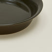 Close up view of Essential pie dish in olive