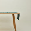 Essential peacock runner on table