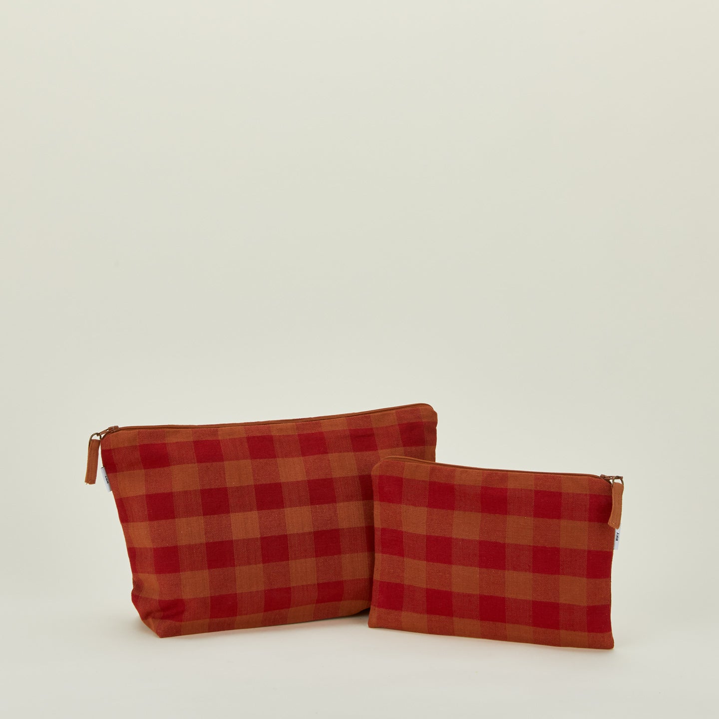 Essential gingham pouches in red and terracotta