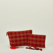 Essential gingham pouches in red and terracotta with embroidery supplies. 