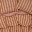 Essential Stripe Duvet - Blush/Terracotta on bed with matching pillow cases