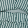 Essential Stripe Pillowcases, Set of 2 - Sky/Peacock on bed  with matching duvet