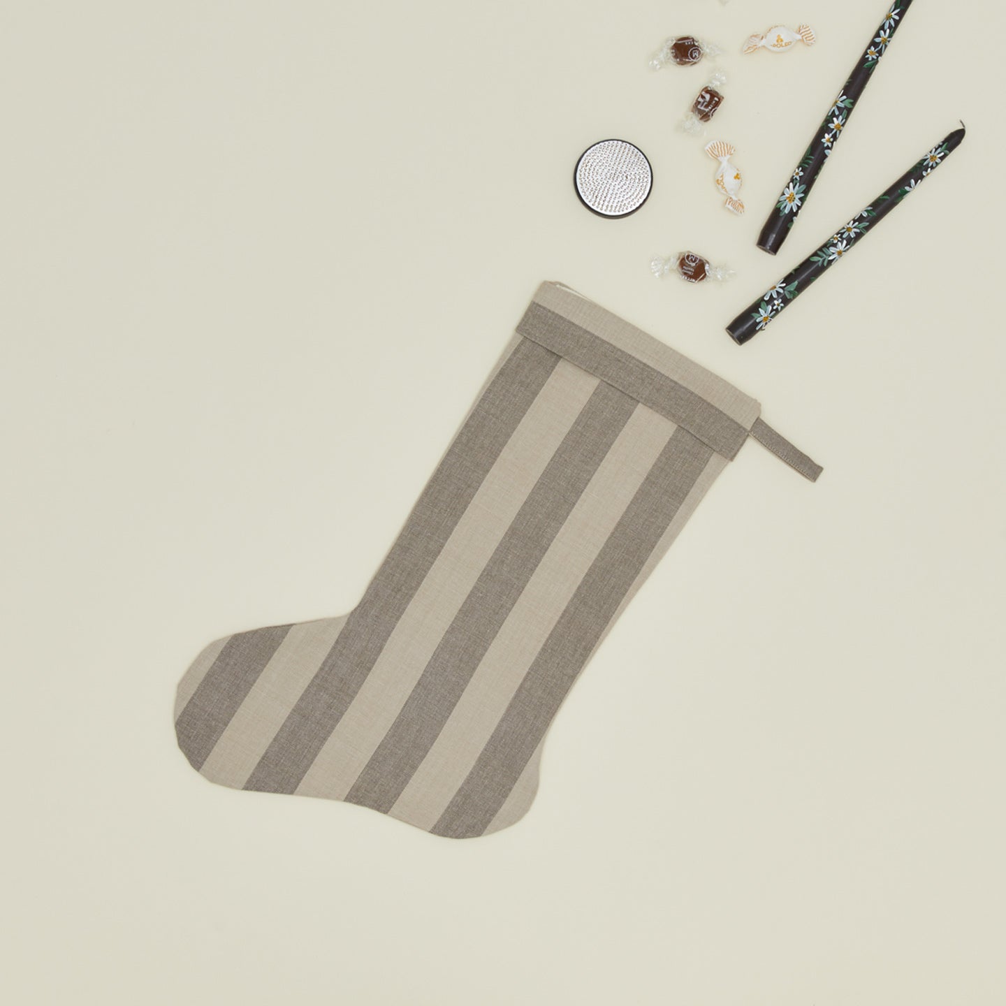 Essential Striped Stocking - Light Grey/Dark Grey with candles, and candies.