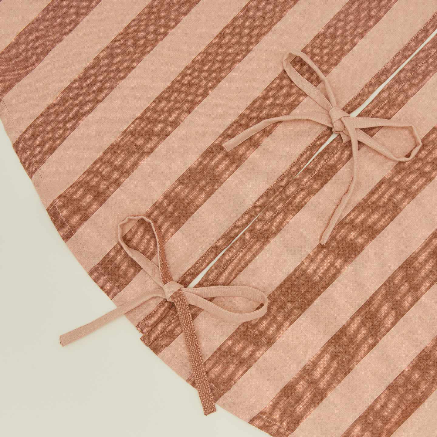 Detailed view of Essential Striped Tree Skirt - Blush/Terracotta
