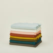 Essential table runner stack in various colors