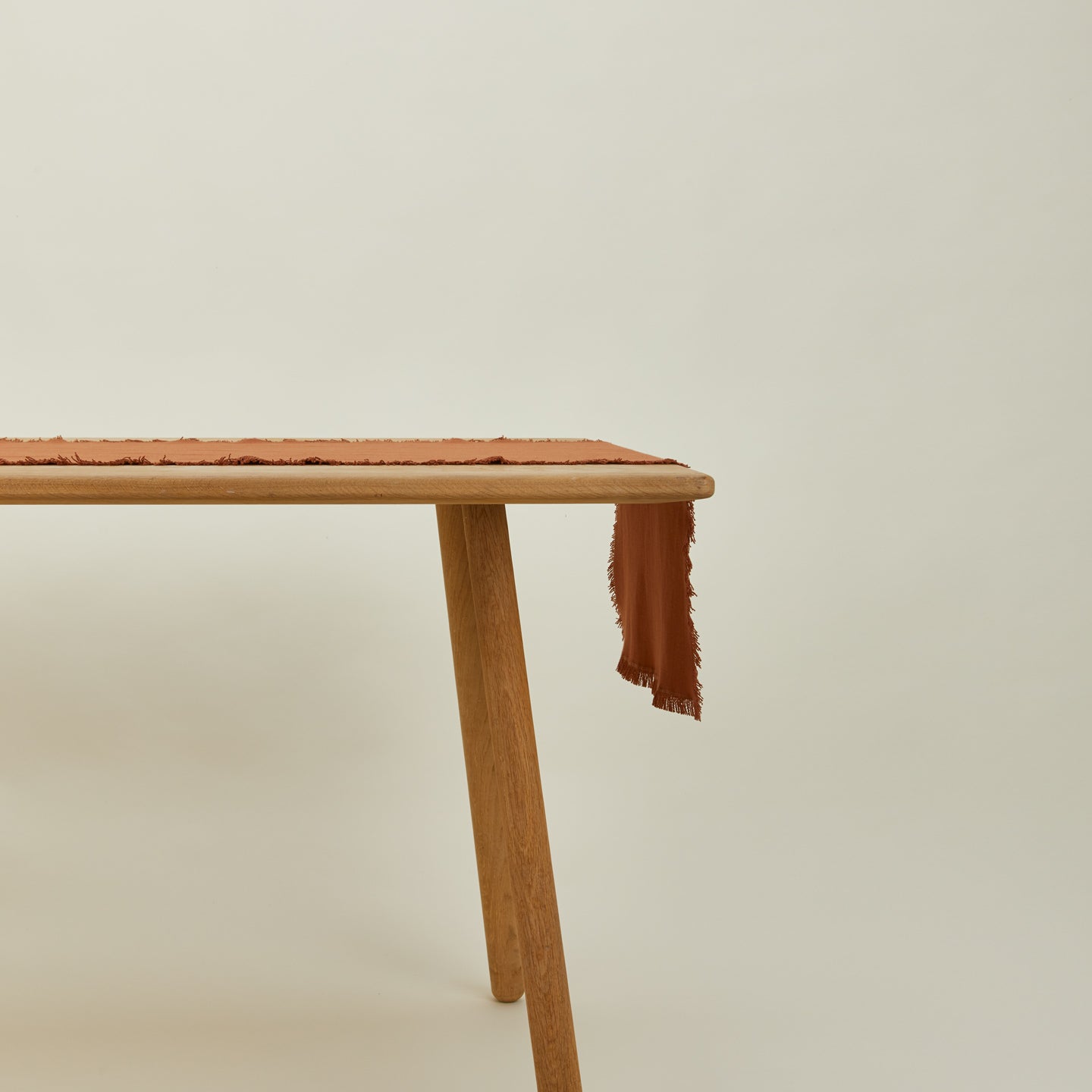 Essential terracotta runner on table