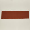 Overhead view of essential terracotta runner