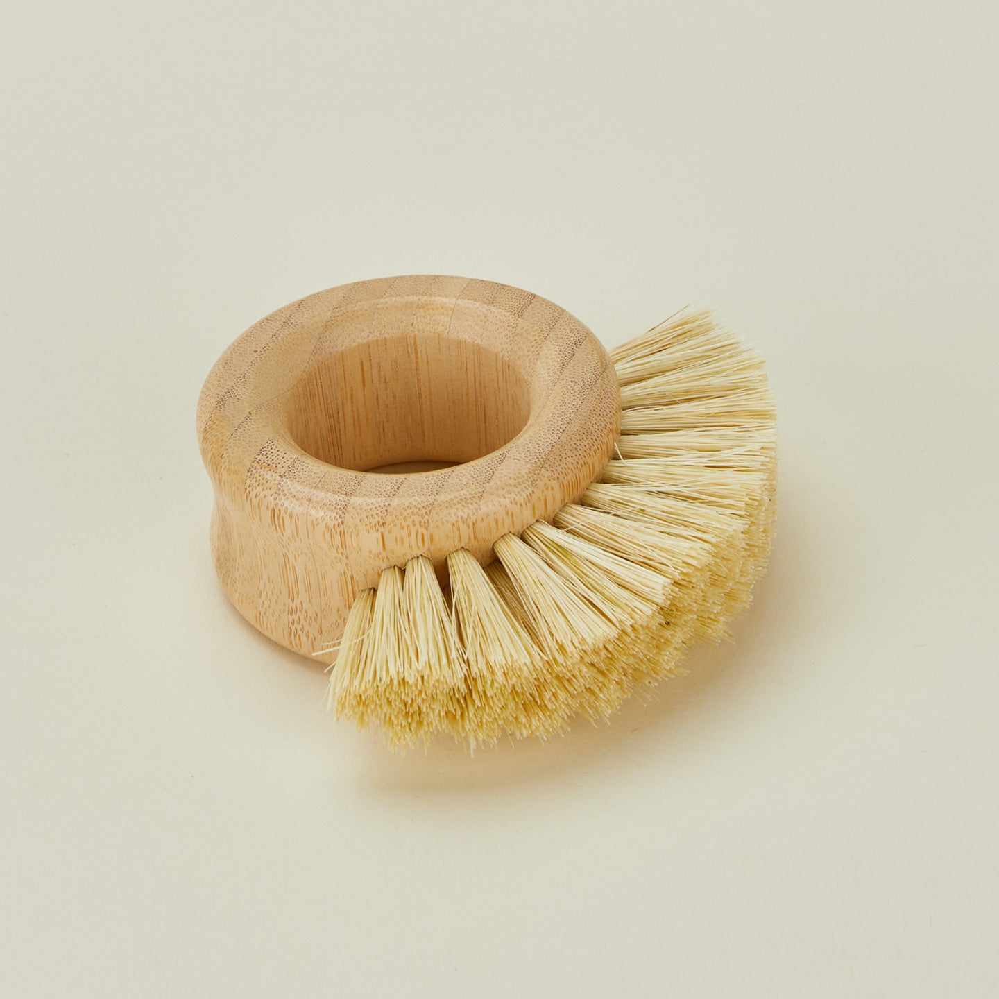 Close up view of round ring shaped cleaning brush