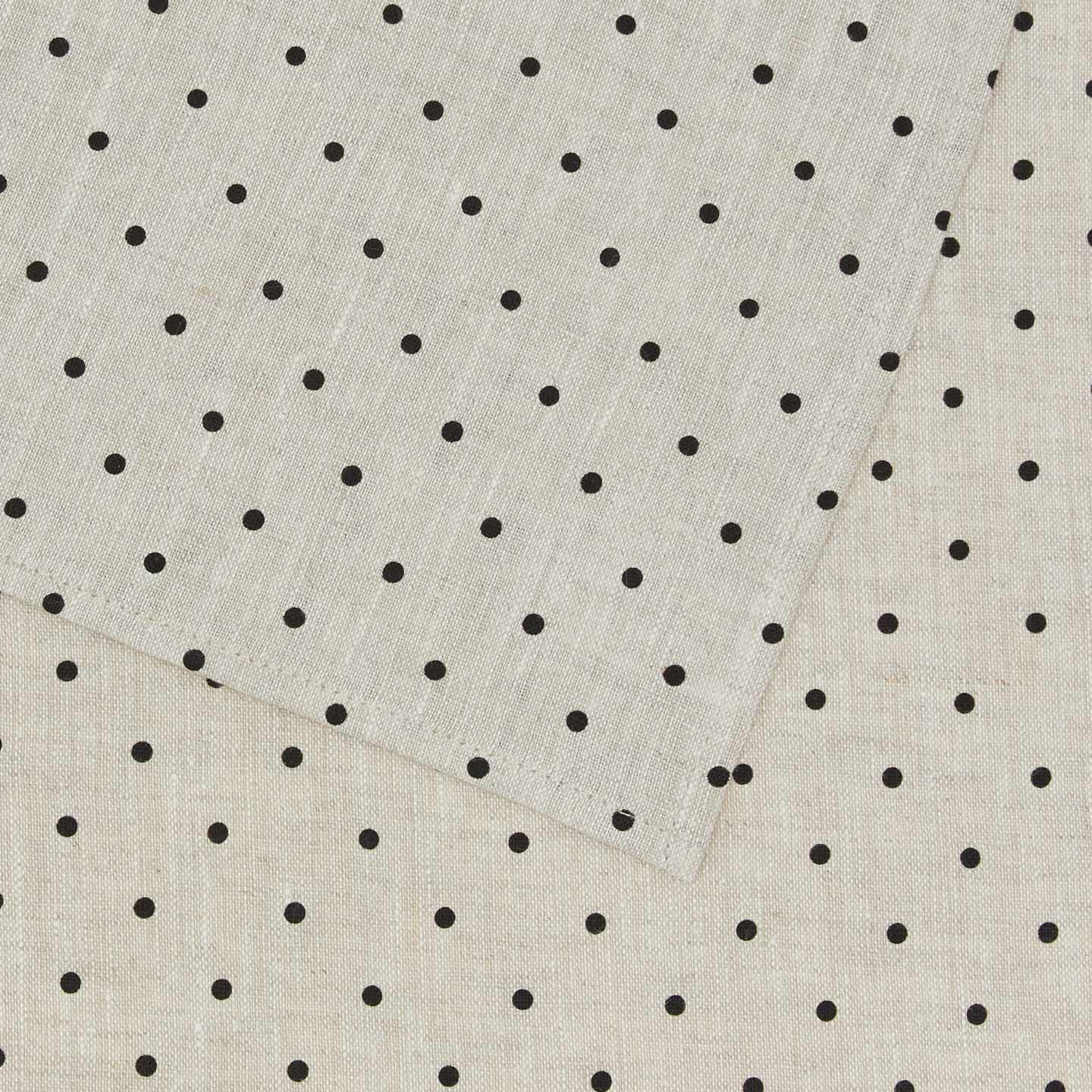 Detailed view of black linen dot placemat