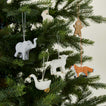 Paper mache ornaments on tree