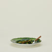 Ginori dinner plate in malachite with fork and green beans