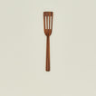 Narrow teak slotted spatula