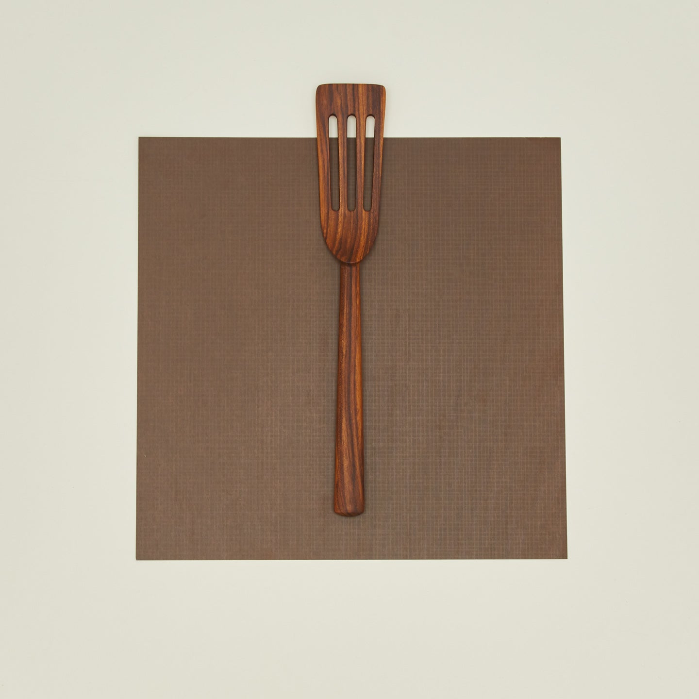Narrow teak slotted spatula