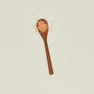 Teak stirring spatula with couscous