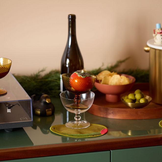 Holiday hosting with glasses on credenza