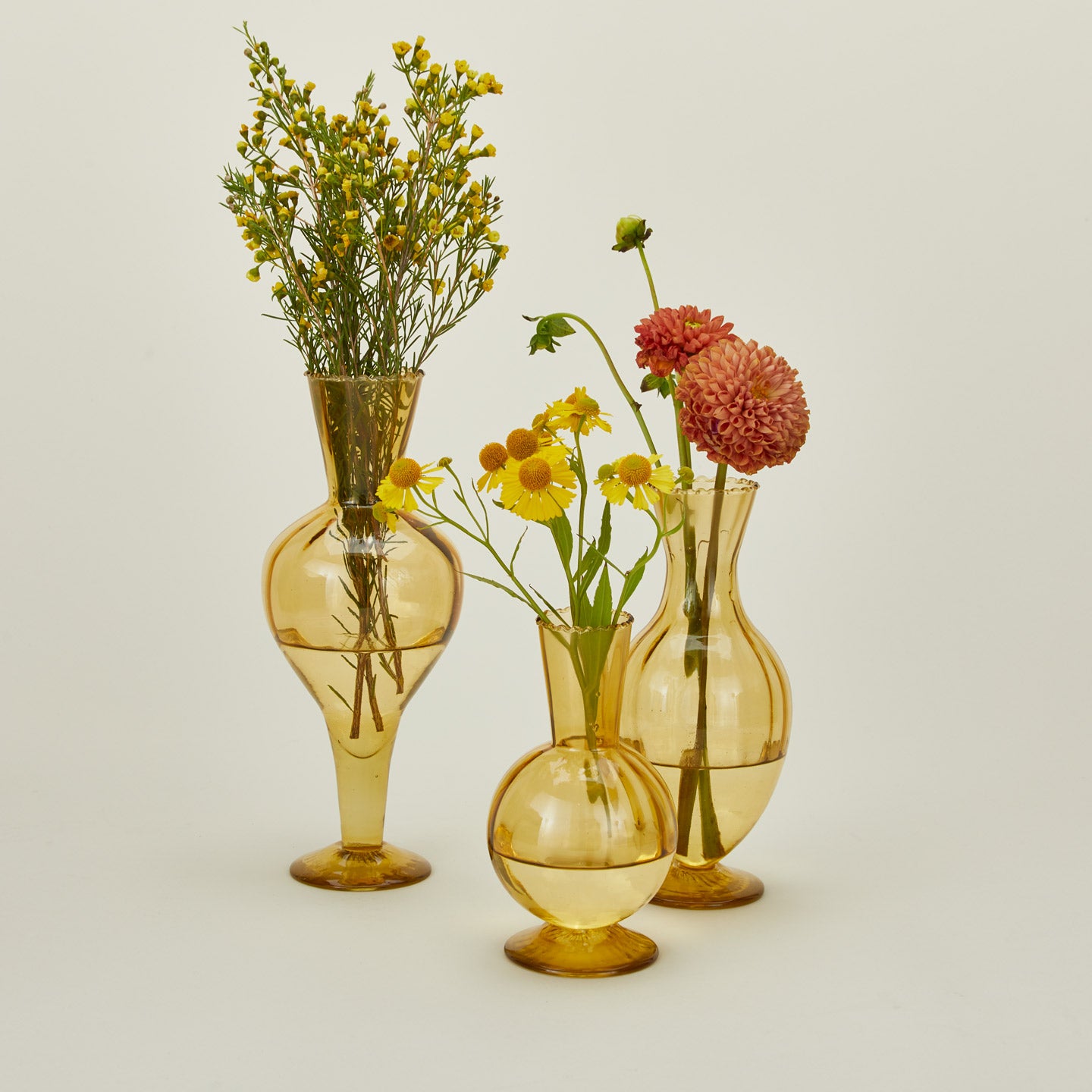 Amber glass vase family