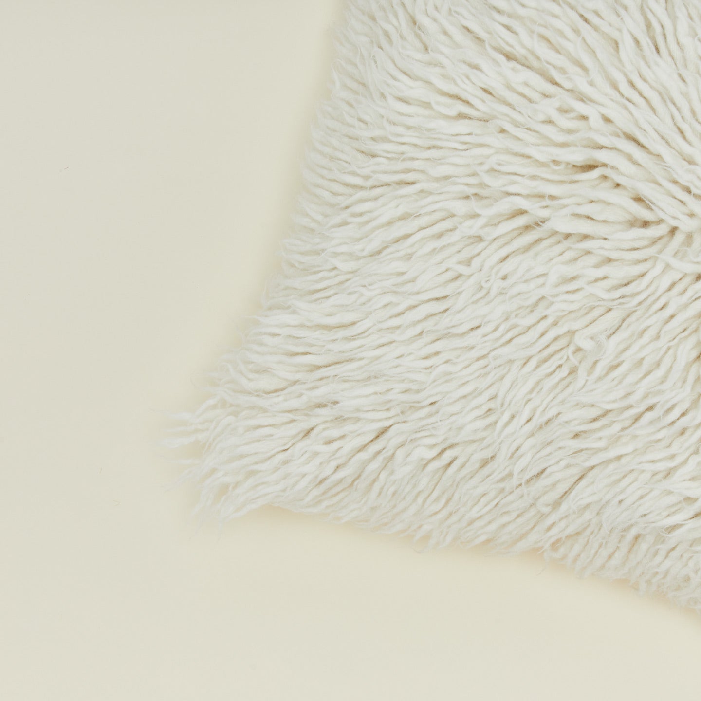 Close up view of Flokati Pillow