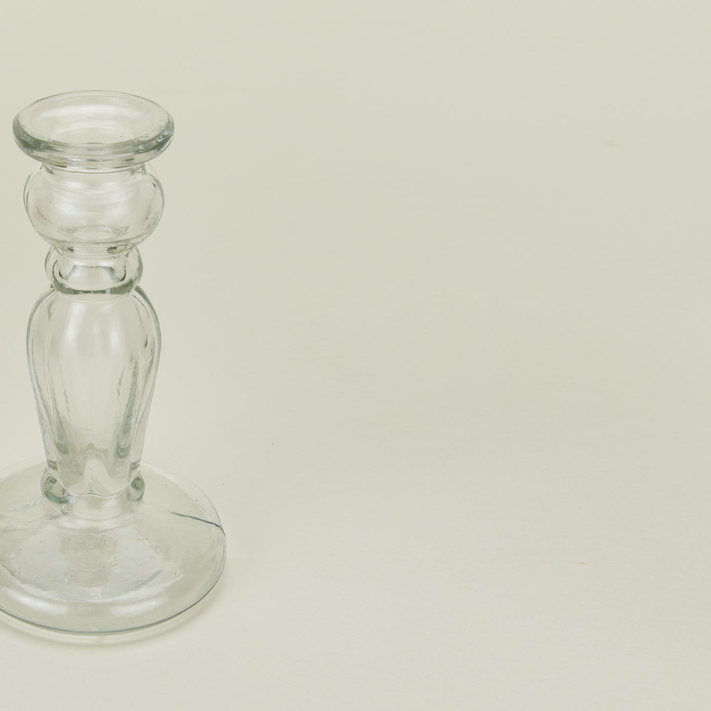 Close up view of small blown glass candlestick holder