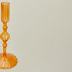 Close up view of Pleated candle holder in amber