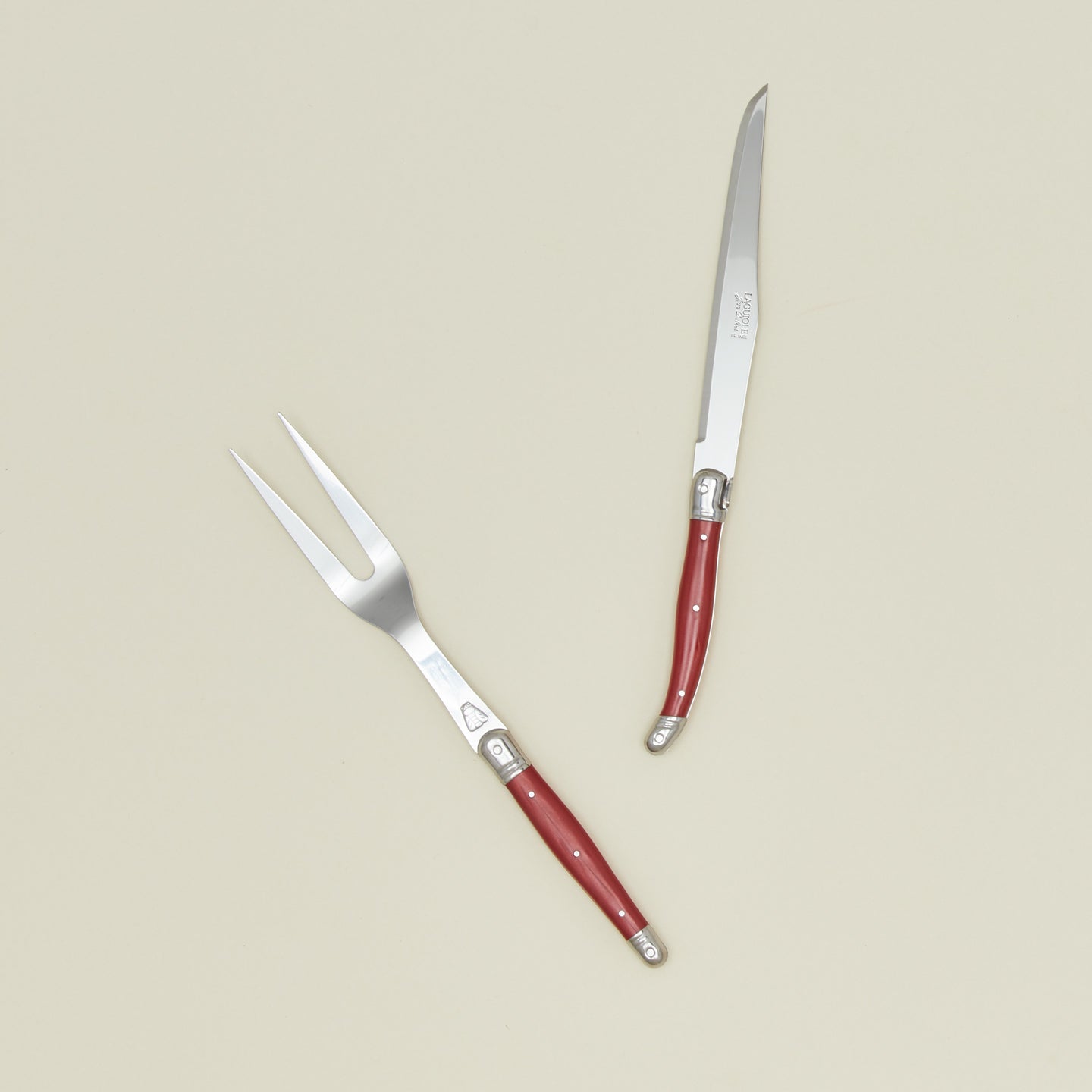 Jean Dubost carving set in red
