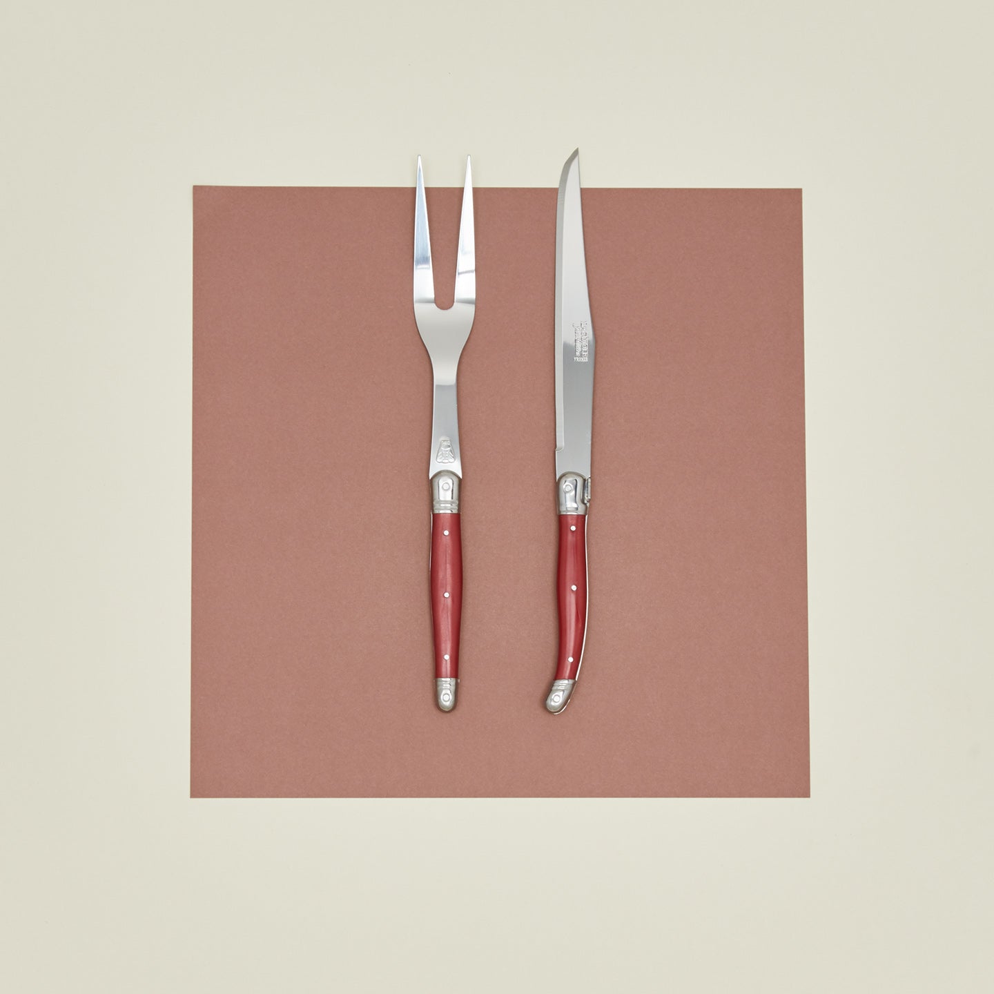 Jean Dubost carving set in red